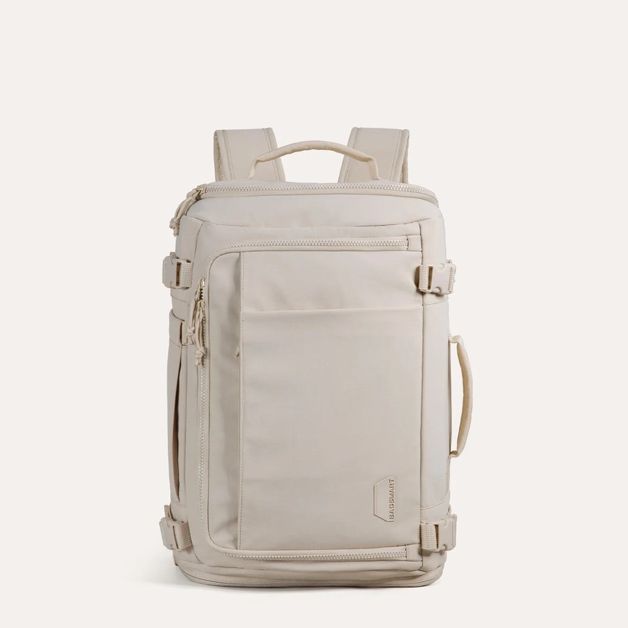 https://cdn.shopify.com/s/files/1/1990/3257/files/Blast_Quick_Access_28L-38L_Carry_On_Travel_Backpack_in_Beige.webp?v=1745837476